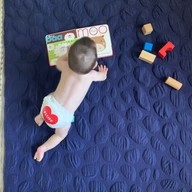 Baby crawling on Navy Blue Nook Lilypad2 Best Baby and Toddler Play mat