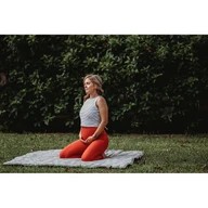 Pregnant woman meditating on Grey Nook Lilypad2 Best Baby and Toddler Play mat
