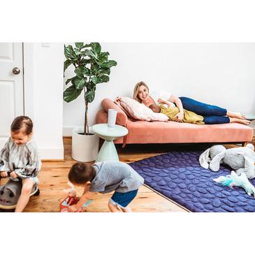Mom nursing baby while kids play on Navy Blue Nook Lilypad2 Best Baby and Toddler Play mat