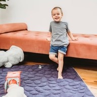Toddler boy on Navy Blue Nook Lilypad2 Best Baby and Toddler Play mat