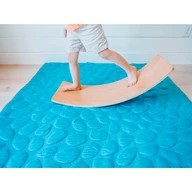 Kid playing on Teal Nook Lilypad2 Best Baby and Toddler Play mat